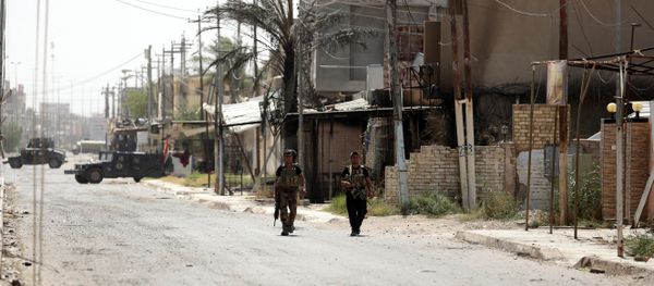 Members with Iraqi counter-terrorism forces patrol Fallujah, Iraq. (File) Members with Iraqi counter-terrorism forces patrol Fallujah, Iraq. (File) - Sputnik International