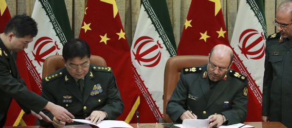 Chinese Defense Minister Chang Wanquan and his Iranian counterpart General Hossein Dehghan Signing Cooperation Deal Chinese Defense Minister Chang Wanquan and his Iranian counterpart General Hossein Dehghan Signing Cooperation Deal - Sputnik International