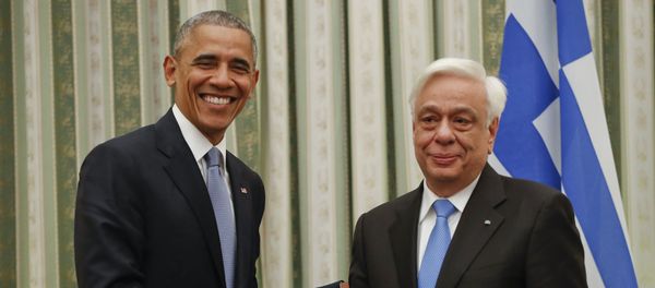 President Barack Obama shakes hands with his Greek counterpart Prokopis Pavlopoulos during their meeting at the Presidential Mansion in Athens - Sputnik International