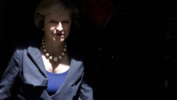 British Prime Minister Theresa May exits 10 Downing Street in London on July 26, 2016. British Prime Minister Theresa May exits 10 Downing Street in London on July 26, 2016. - Sputnik International