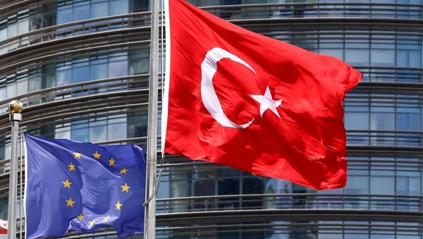 A European Union (L) and Turkish flag fly outside a hotel in Istanbul, Turkey, May 4, 2016. A European Union (L) and Turkish flag fly outside a hotel in Istanbul, Turkey, May 4, 2016. - Sputnik International