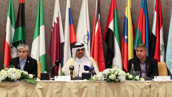 Secretary General of the Gas Exporting Countries Forum (GECF) Seyed Mohammad Hossein Adeli of Iran (L) and Qatar's Energy Minister Mohammed bin Saleh al-Sada (C) attend the 18th Ministerial Meeting of GECF in Doha, Qatar November 17, 2016 - Sputnik International