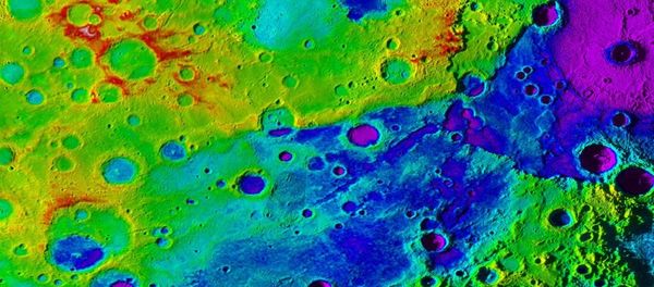 Using colorized topography, Mercury’s great valley (dark blue) and Rembrandt impact basin (purple, upper right) are revealed in this high-resolution digital elevation model merged with an image mosaic obtained by NASA’s MESSENGER spacecraft. - Sputnik International
