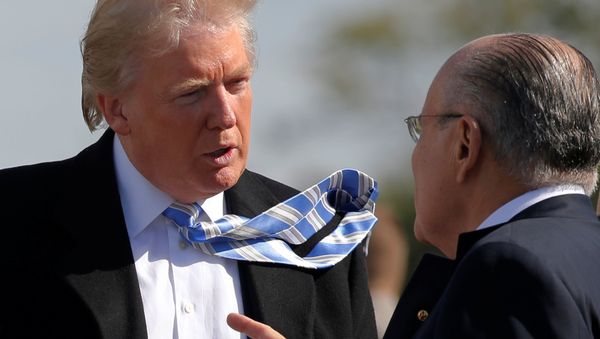 Republican U.S. presidential nominee Donald Trump speaks with former New York mayor Rudy Giuliani (File)  - Sputnik International