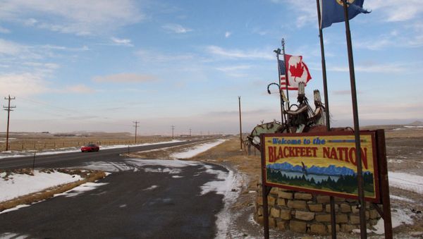 This Dec. 12,2012 photo shows a sign welcoming visitors to the Blackfeet Indian reservation on Dec. 12, 2012 This Dec. 12,2012 photo shows a sign welcoming visitors to the Blackfeet Indian reservation on Dec. 12, 2012 - Sputnik International
