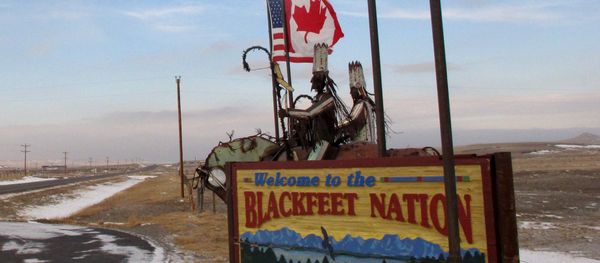 This Dec. 12,2012 photo shows a sign welcoming visitors to the Blackfeet Indian reservation on Dec. 12, 2012 This Dec. 12,2012 photo shows a sign welcoming visitors to the Blackfeet Indian reservation on Dec. 12, 2012 - Sputnik International