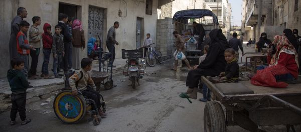 Syrian families receive aid packages in Aleppo Syrian families receive aid packages in Aleppo - Sputnik International