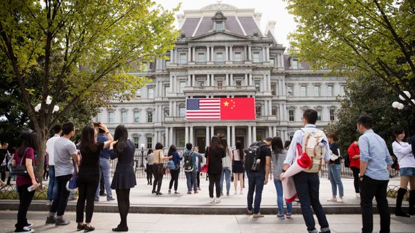 China's flag is displayed next to the American flag on the side of the Old Executive Office Building on the White House complex in Washington (File) China's flag is displayed next to the American flag on the side of the Old Executive Office Building on the White House complex in Washington (File) - Sputnik International