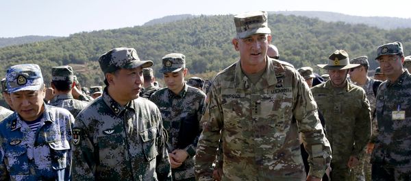 U.S. Army Pacific commander Gen. Robert Brown, center right, and Gen. Liu Xiaowu, center left, the commander for Southern Theater Command Army of Chinese Liberation Army (PLA), inspect a rescue operation venue for the U.S.-China Disaster Management Exchange (DME) drill at a PLA's training base in Kunming, southwestern China's Yunnan Province, Friday, Nov. 18, 2016 U.S. Army Pacific commander Gen. Robert Brown, center right, and Gen. Liu Xiaowu, center left, the commander for Southern Theater Command Army of Chinese Liberation Army (PLA), inspect a rescue operation venue for the U.S.-China Disaster Management Exchange (DME) drill at a PLA's training base in Kunming, southwestern China's Yunnan Province, Friday, Nov. 18, 2016 - Sputnik International