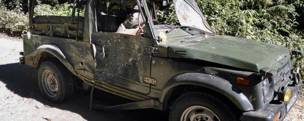 Bullet marks are seen on a damaged army vehicle at Pengeri in Assam's Tinsukia district on November 19, 2016, following an ambush attack by armed militants - Sputnik International