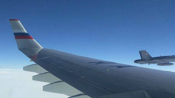 On Friday, military aircraft with the Swiss insignia have escorted the plane with the Russian delegation, including journalists and Alexander Fomin - Sputnik International