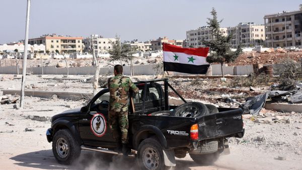 Members of Syrian pro-government forces drive their pick-up in the village of Minyan, west of Aleppo, after they retook the area from rebel fighters on November 12, 2016 Members of Syrian pro-government forces drive their pick-up in the village of Minyan, west of Aleppo, after they retook the area from rebel fighters on November 12, 2016 - Sputnik International