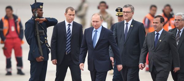 Russia's President Vladimir Putin walks upon arrival at Jorge Chavez International Airport in Lima to attend the Asia-Pacific Economic Cooperation (APEC) Summit on November 19, 2016 Russia's President Vladimir Putin walks upon arrival at Jorge Chavez International Airport in Lima to attend the Asia-Pacific Economic Cooperation (APEC) Summit on November 19, 2016 - Sputnik International