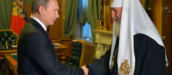 Russian President Vladimir Putin and Orthodox Patriarch Kirill during a meeting in Kremlin on November 21, 2015 Russian President Vladimir Putin and Orthodox Patriarch Kirill during a meeting in Kremlin on November 21, 2015 - Sputnik International