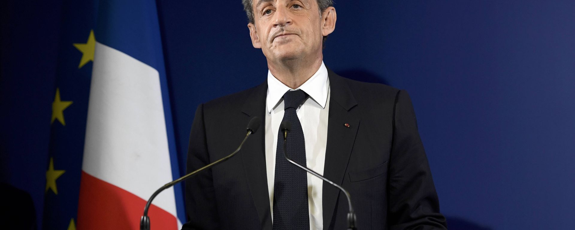 Nicolas Sarkozy, former French president and candidate for the French conservative presidential primary, reacts after partial results in the first round of the French center-right presidential primary election at his campaign headquarters in Paris, France, November 20, 2016. - Sputnik International, 1920, 04.03.2021