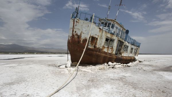 FILE - In this Friday, April 29, 2011 file photo, an abandoned ship is stuck in the solidified salts of the Oroumieh Lake, Iran. - Sputnik International