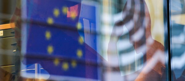 Reflection of the EU flag in a window of a building in Brussels. (File) - Sputnik International