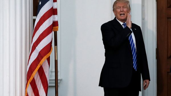 US President-elect Donald Trump yells to members of the media from the steps of the main clubhouse at Trump National Golf Club in Bedminster, New Jersey, US, November 19, 2016. US President-elect Donald Trump yells to members of the media from the steps of the main clubhouse at Trump National Golf Club in Bedminster, New Jersey, US, November 19, 2016. - Sputnik International