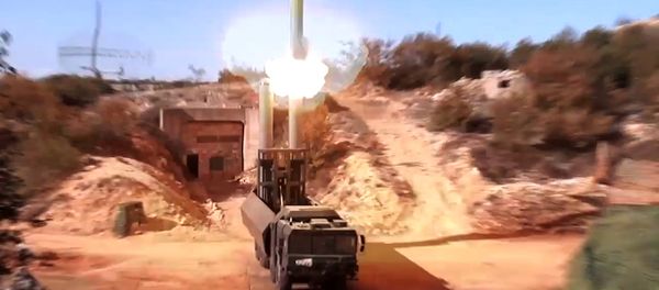 Oniks cruise missiles being launched from the Bastion mobile coastal defence missile system at terrorist targets in Syria. Still from a video provided by the Rusian Defense Ministry. - Sputnik International