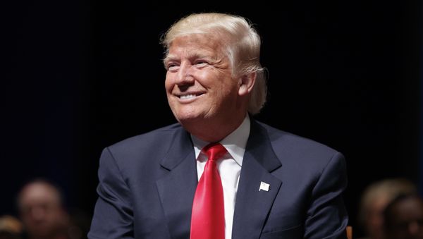 Republican presidential candidate Donald Trump smiles during a town hall, Tuesday, Sept. 6, 2016, in Virginia Beach, Va. Republican presidential candidate Donald Trump smiles during a town hall, Tuesday, Sept. 6, 2016, in Virginia Beach, Va. - Sputnik International