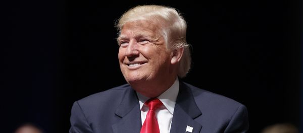 Republican presidential candidate Donald Trump smiles during a town hall, Tuesday, Sept. 6, 2016, in Virginia Beach, Va. Republican presidential candidate Donald Trump smiles during a town hall, Tuesday, Sept. 6, 2016, in Virginia Beach, Va. - Sputnik International