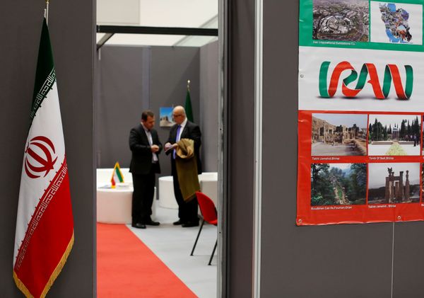 Iranian exhibitors stand in a booth during the opening of the fair Iran country presentation in Rome, Italy November 22, 2016 - Sputnik International