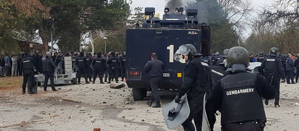 Bulgarian riot police are seen inside a refugee center during clashes in the town of Harmanli, Bulgaria, November 24, 2016 Bulgarian riot police are seen inside a refugee center during clashes in the town of Harmanli, Bulgaria, November 24, 2016 - Sputnik International