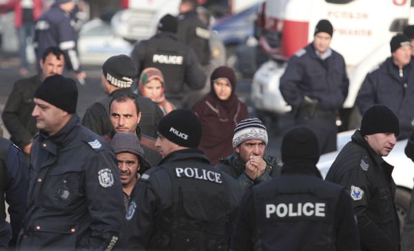 Migrants are seen in front of Bulgarian police after clashes inside a refugee center in the town of Harmanli, Bulgaria, November 25, 2016 Migrants are seen in front of Bulgarian police after clashes inside a refugee center in the town of Harmanli, Bulgaria, November 25, 2016 - Sputnik International