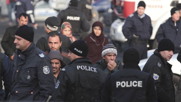 Migrants are seen in front of Bulgarian police after clashes inside a refugee center in the town of Harmanli, Bulgaria, November 25, 2016 Migrants are seen in front of Bulgarian police after clashes inside a refugee center in the town of Harmanli, Bulgaria, November 25, 2016 - Sputnik International