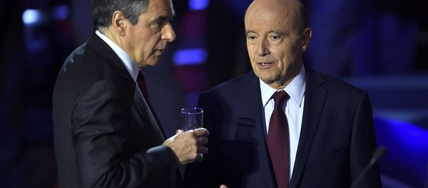 French politicians Alain Juppe, and Francois Fillon arrive on stage to attend the second prime-time televised debate for the French conservative presidential primary in Paris, France, November 3, 2016 French politicians Alain Juppe, and Francois Fillon arrive on stage to attend the second prime-time televised debate for the French conservative presidential primary in Paris, France, November 3, 2016 - Sputnik International