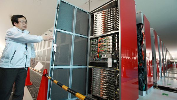 A staff member of Japan's national Riken institute opens a rack of the world's fastest supercomputer named the K Computer at Riken's laboratory in Kobe city in Hyogo prefecture, western Japan on June 21, 2011 A staff member of Japan's national Riken institute opens a rack of the world's fastest supercomputer named the K Computer at Riken's laboratory in Kobe city in Hyogo prefecture, western Japan on June 21, 2011 - Sputnik International