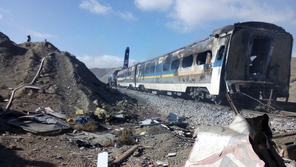 This picture released by Iranian Fars News Agency shows the scene of two trains collision about 150 miles (250 kilometers) east of the capital Tehran, Iran, Friday, Nov. 25, 2016 This picture released by Iranian Fars News Agency shows the scene of two trains collision about 150 miles (250 kilometers) east of the capital Tehran, Iran, Friday, Nov. 25, 2016 - Sputnik International