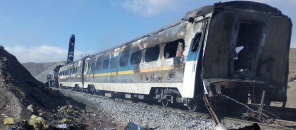 This picture released by Iranian Fars News Agency shows the scene of two trains collision about 150 miles (250 kilometers) east of the capital Tehran, Iran, Friday, Nov. 25, 2016 - Sputnik International
