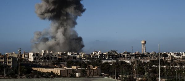 Smokes rises after an airstrike on an Islamic State militants held area in Sirte, Libya (File) Smokes rises after an airstrike on an Islamic State militants held area in Sirte, Libya (File) - Sputnik International