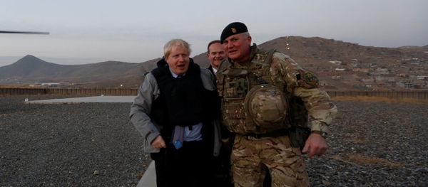 Britain's Foreign Secretary Boris Johnson (L) and Brigadier Ian Rigden, (R) Chief mentor At Afghan National Army Officer Academy arrives during his visits at Camp Qargha in Kabul, Afghanistan November 26, 2016 - Sputnik International