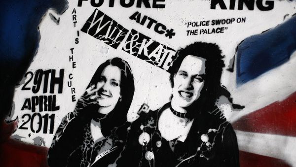 A newly unveiled graffiti portrait of Prince William and Kate Middleton by street artist Rich Simmons, in London, Friday, Feb. 11, 2011. It is probably not quite the wedding portrait Prince William and Kate Middleton had in mind. The soon-to-be-married couple have been made over as punk 'royalty' by an artist who has transformed them into the King and Queen of rockers, Sid Vicious and Nancy Spungen, and it was a Prince's Trust grant that helped artist Rich Simmons hone his skills which led to the punky version of the pair. - Sputnik International