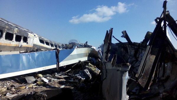 This picture released by Iranian Fars News Agency shows the scene of two trains collision about 150 miles (250 kilometers) east of the capital Tehran, Iran, Friday, Nov. 25, 2016 - Sputnik International