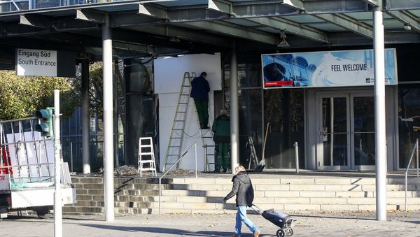 Workers repair the entrance at the fair grounds in Hamburg, Germany, Sunday Nov, 27, 2016 Workers repair the entrance at the fair grounds in Hamburg, Germany, Sunday Nov, 27, 2016 - Sputnik International