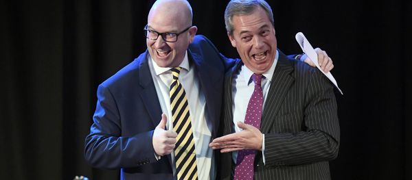 United Kingdom Independence Party (UKIP) interim leader Nigel Farage (R) embraces newly elected leader Paul Nuttall, in London, Britain November 28, 2016 - Sputnik International