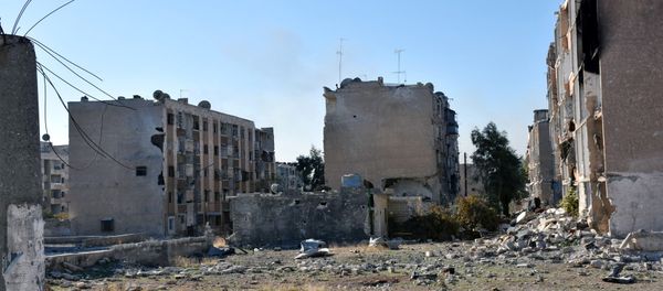 Damaged buildings are pictured in Hanano housing district after government forces took control of the area in Aleppo, Syria in this handout picture provided by SANA on November 27, 2016. - Sputnik International