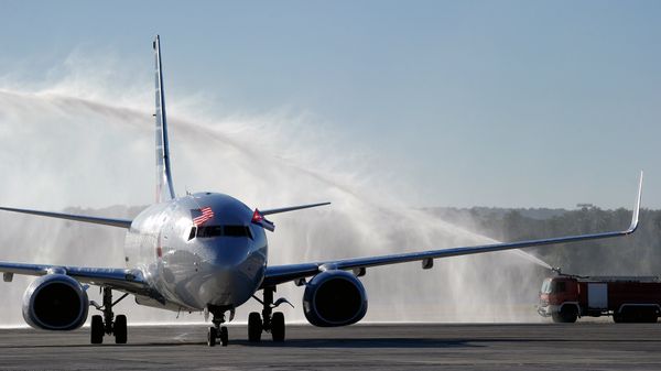 An American Airlines plane arrives at Jose Marti International Airport becoming the first Miami-Havana commercial flight in 50 years, coinciding with the beginning of the tributes to late Cuban leader Fidel Castro, on November 28, 2016 in Havana An American Airlines plane arrives at Jose Marti International Airport becoming the first Miami-Havana commercial flight in 50 years, coinciding with the beginning of the tributes to late Cuban leader Fidel Castro, on November 28, 2016 in Havana - Sputnik International