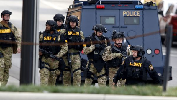 Law enforcement officials are seen outside of a parking garage on the campus of Ohio State University as they respond to an active attack in Columbus, Ohio Law enforcement officials are seen outside of a parking garage on the campus of Ohio State University as they respond to an active attack in Columbus, Ohio - Sputnik International