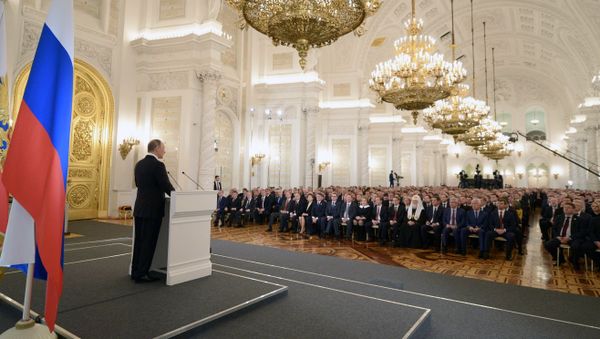 December 3, 2015. Russian President Vladimir Putin delivers his annual Presidential Address to the Federal Assembly at the Kremlin's St. George Hall. - Sputnik International