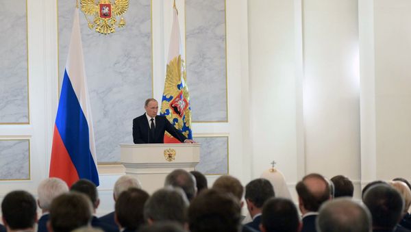 December 3, 2015. Russian President Vladimir Putin delivers his annual Presidential Address to the Federal Assembly at the Kremlin's St. George Hall. - Sputnik International
