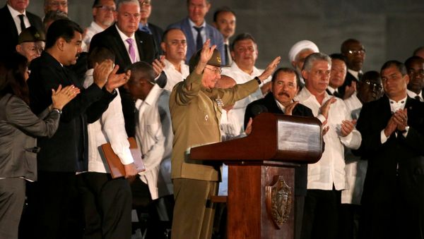 Cuban President Raul Castro acknowledges the applause from the crowd as he attends a massive tribute to Cuba's late President Fidel Castro in Revolution Square in Havana, Cuba, November 29, 2016. Cuban President Raul Castro acknowledges the applause from the crowd as he attends a massive tribute to Cuba's late President Fidel Castro in Revolution Square in Havana, Cuba, November 29, 2016. - Sputnik International