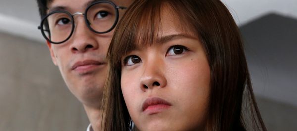 Pro-independence activists Yau Wai-Ching (R) and Baggio Leung meet journalists outside High Court after they lost an appeal against their disqualification as lawmakers in Hong Kong, China November 30, 2016. - Sputnik International