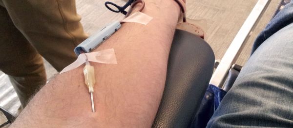 Someone receiving a blood transfusion Someone receiving a blood transfusion - Sputnik International