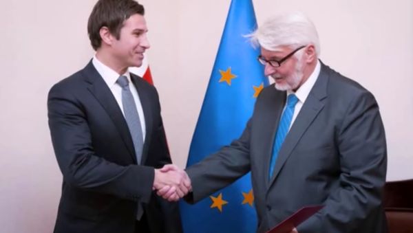 Poland's Deputy Foreign Minister Robert Grey (L). (File) - Sputnik International