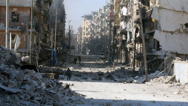 Syrians walk over rubble of damaged buildings, Aleppo, Syria. Syrians walk over rubble of damaged buildings, Aleppo, Syria. - Sputnik International