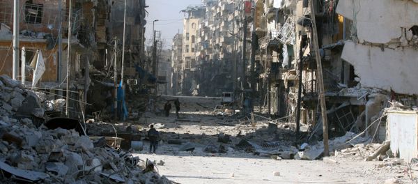 Syrians walk over rubble of damaged buildings, Aleppo, Syria. Syrians walk over rubble of damaged buildings, Aleppo, Syria. - Sputnik International